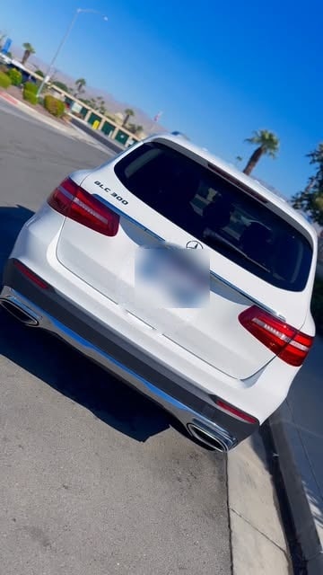 A white Mercedes-Benz after a new bumper and liftgate repair